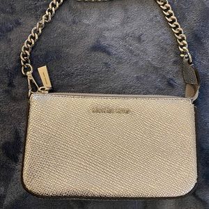 MICHAEL KORS SILVER CLUTCH/PURSE